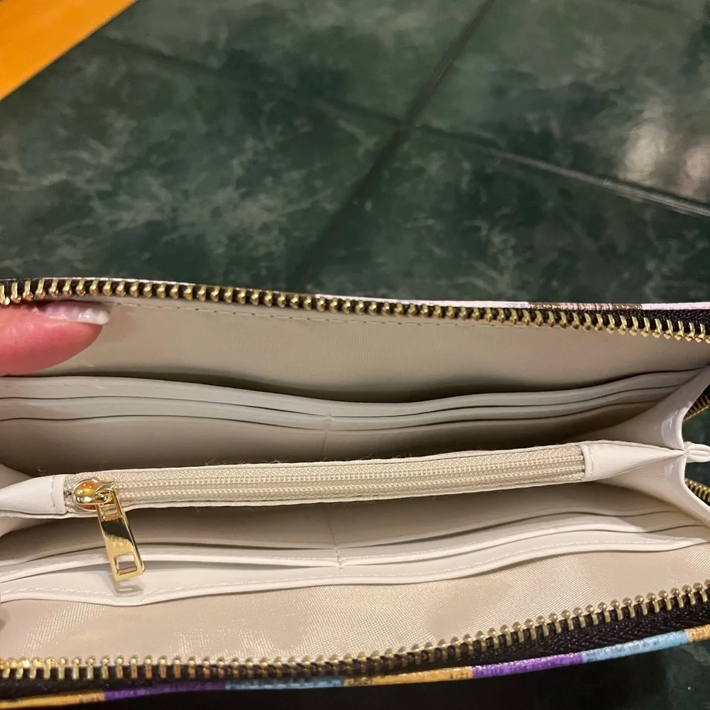 Taylor swift themed wallet.  Never used